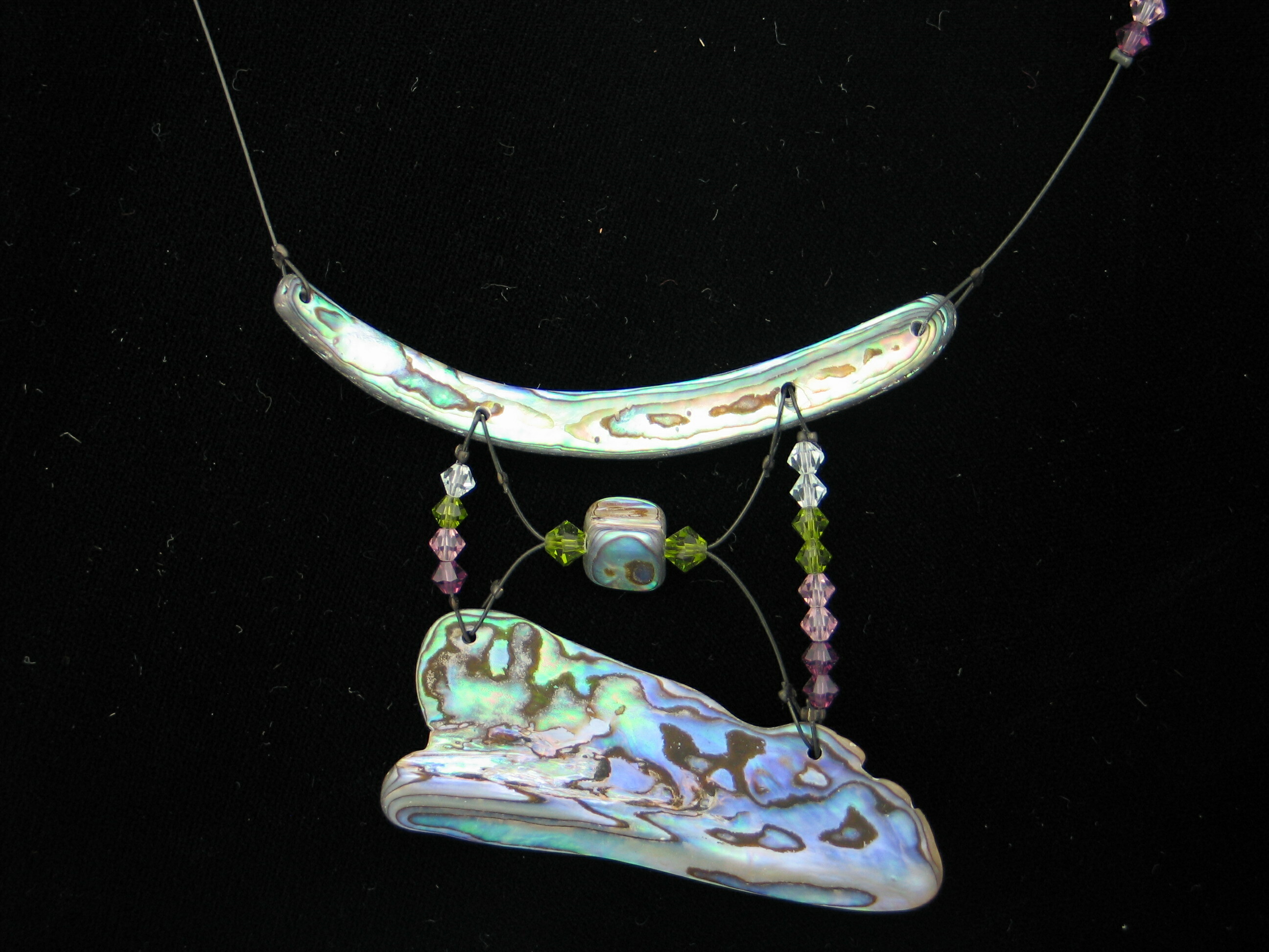 Blue Abalone Paua Jewelry, with natural shapes and rim pieces